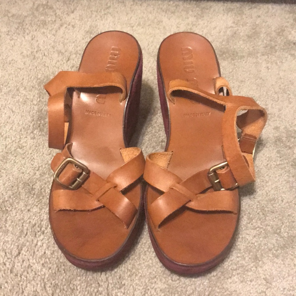 Leather and suede platform sandals.